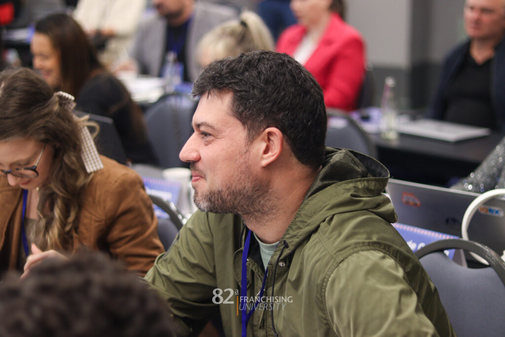 aluno satisfeito com as palestras na franchising university 82